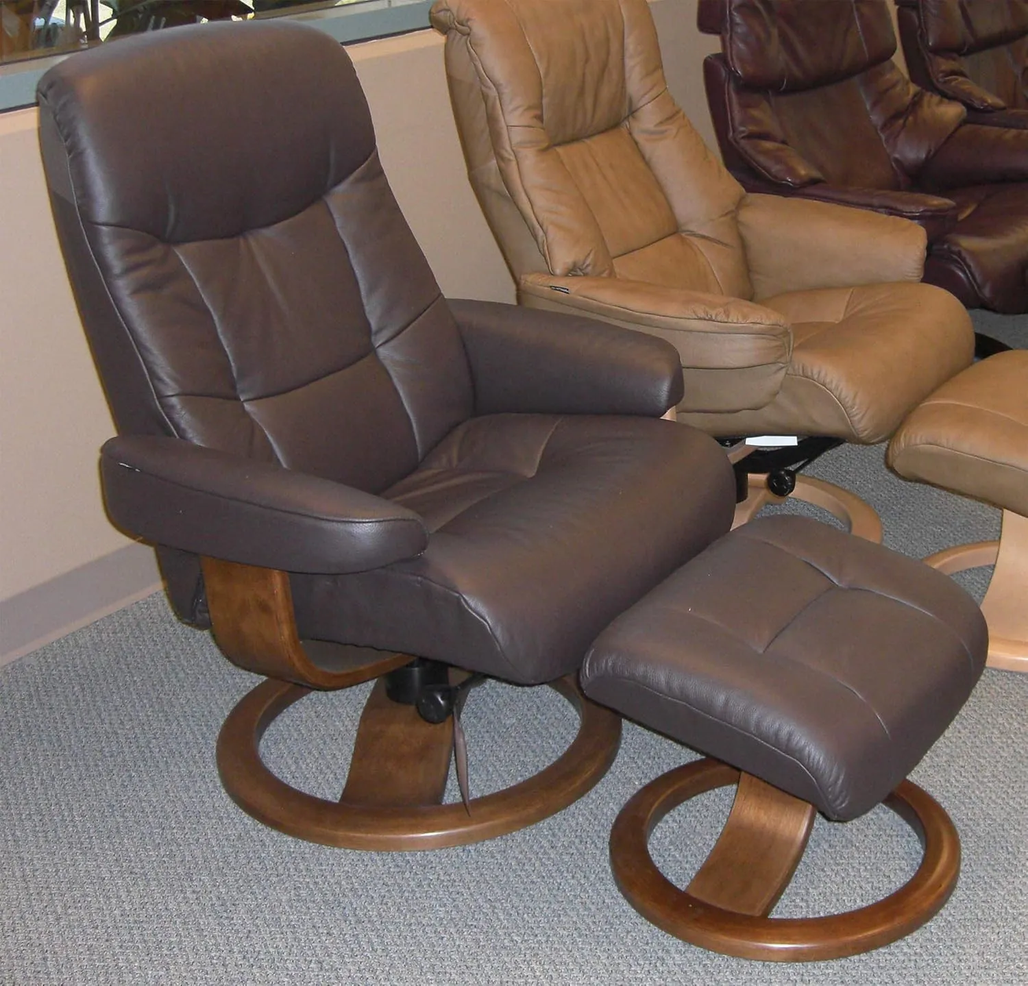 Large Leather Swivel Recliner Chair with Ottoman in Havana Dark Brown NL 120 Nordic Line Leather with a Lite Oak Wood Stain Base