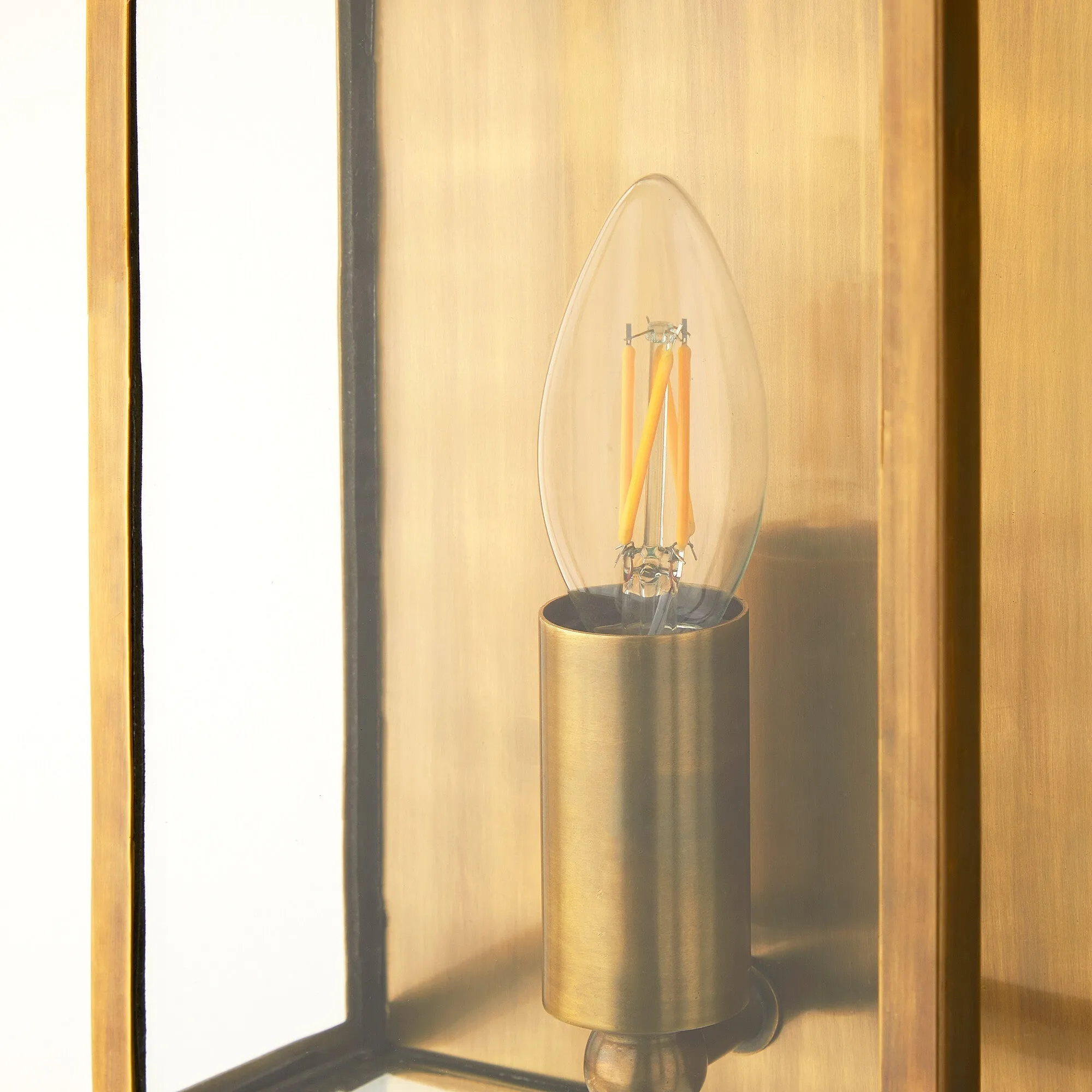 Orford IP44 exterior wall light in antique brass