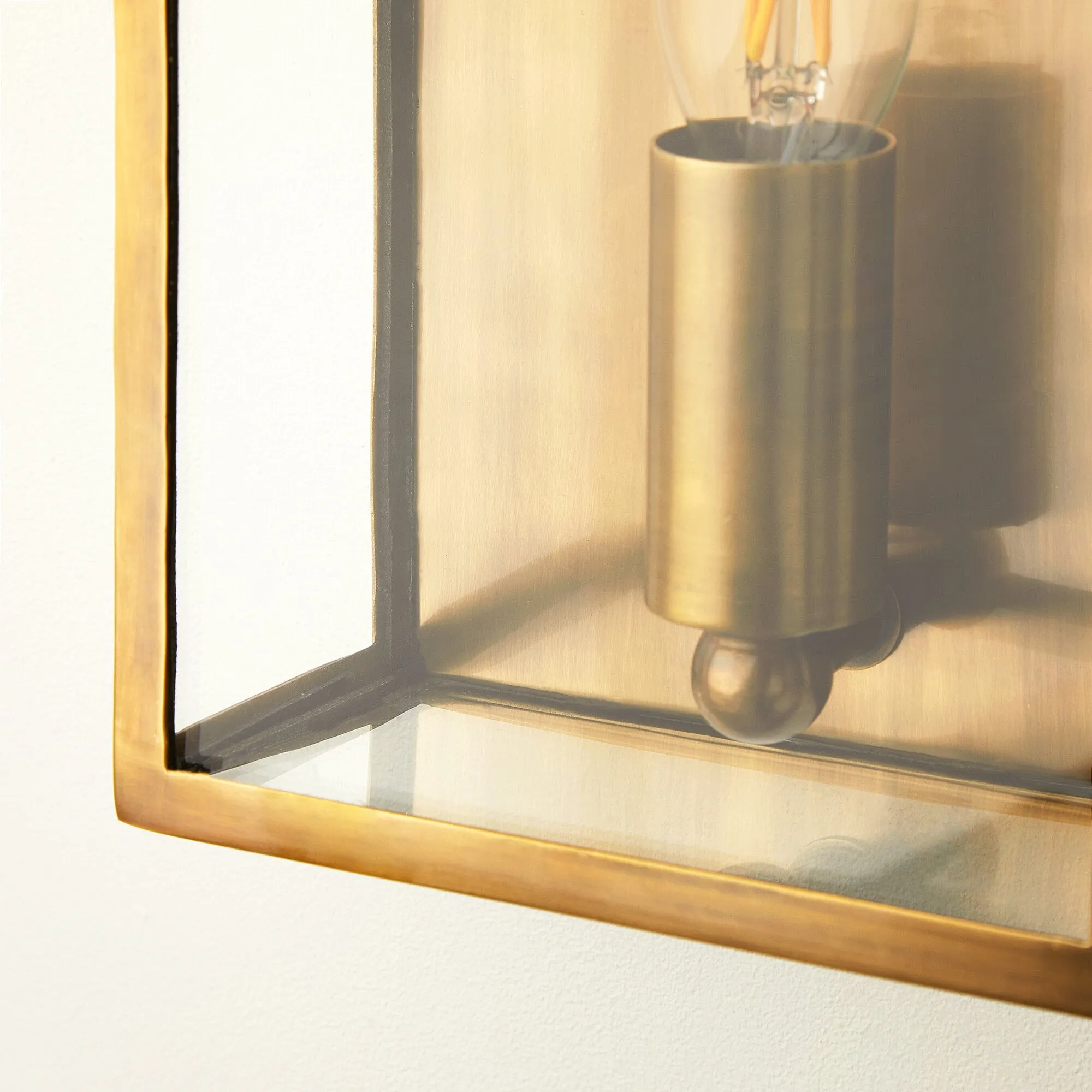 Orford IP44 exterior wall light in antique brass